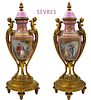 Pair Of 19th C. Figural Bronze Hand Painted Pink Sevres Urns