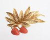 An 18k Gold and Coral Strawberry Pin