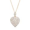 A DIAMOND HEART PENDANT NECKLACE in yellow gold, designed as a heart set with round brilliant cut...