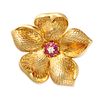 TIFFANY & CO., A RUBY AND DIAMOND FLOWER BROOCH in 18ct yellow gold, designed as a flower set wit...