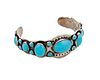A Navajo ingot silver and turquoise cuff bracelet