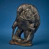 An Inuit carved stone figure, Early/mid-20th century
