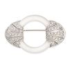 A FROSTED ROCK CRYSTAL AND DIAMOND BROOCH in 18ct white gold, set with a circular ring of frosted...