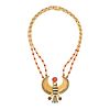 AN EGYPTIAN REVIVAL CORAL AND ENAMEL FALCON NECKLACE in 18ct yellow gold, comprising two rows of ...