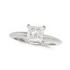 TIFFANY & CO., A SOLITAIRE DIAMOND ENGAGEMENT RING in platinum, set with a princess cut diamond o...