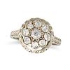 A DIAMOND CLUSTER RING in white gold, set with a cluster of old cut diamonds within an engraved g...