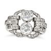 A DIAMOND DRESS RING set with two old European cut diamonds of approximately 0.61 and 0.69 carats...