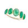 AN EMERALD FIVE STONE RING in 14ct yellow gold, set with five oval cabochon cut emeralds all tota...