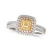 A YELLOW DIAMOND CLUSTER RING in 18ct white gold, set to the centre with a radiant cut yellow dia...