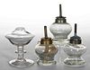 ASSORTED GLASS WHALE OIL / FLUID SPARKING LAMPS, LOT OF FOUR