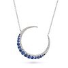 A SAPPHIRE AND DIAMOND CRESCENT MOON NECKLACE in white gold, the pendant designed as a crescent m...