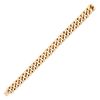 A VINTAGE FRENCH GOLD CURB LINK BRACELET in 18ct yellow gold, comprising a row of plain curb link...