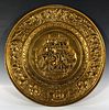 ORNATE ROUND BRASS WALL PLATE WITH NAUTICAL SCENE