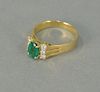 Emerald and 14K gold ring.