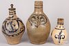 Three German stoneware pitchers
