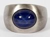 CABOCHON STAR SAPPHIRE AND GOLD GENTLEMAN'S RING