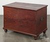 Pennsylvania painted pine blanket chest, 19th c., retaining an old red grained surface, 25'' h.