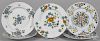 Five Delft plates, 18th c., with floral decoration, 9'' dia.