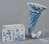 Delft wall pocket, 9'' h. and a flower brick, 18th c., 3 1/2'' x 5 3/4''.