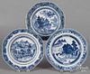 Two Chinese export porcelain blue and white shallow bowls, 9 5/8'' dia., together with a plate