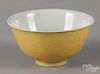 Chinese Qing dynasty yellow ground porcelain bowl with incised dragon and cloud design, Tao-Kuang