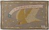 Patriotic hooked rug with an American eagle and whale border, 30'' x 48''.