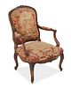 A French Louis XV-style fauteuil armchair