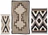 Two Navajo Rugs and a Saddle Blanket
