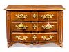 A Regence Style Gilt Bronze Mounted Oak Commode Height 34 x width 53 x depth 25 1/2 inches.