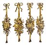 A Set of Four Louis XVI Style Gilt Bronze Military Wall Trophies Height of tallest 59 inches.