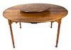 An American Maple Lazy Susan Table Height 29 x diameter 60 inches.