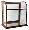 A Wood Framed Glass Display Case Height 23 3/4 x width 21 x depth 14 1/2 inches.