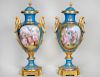 PAIR SEVRES TURQUOISE GROUND PORCELAIN URNS