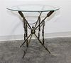 * A Neoclassical Style Brass and Glass Side Table Height 25 1/2 x diameter 26 inches