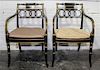 A Pair of Regency Style Parcel Gilt Ebonized Dining Armchairs Height 32 1/2 inches.