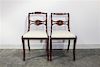 * A Pair of Regency Style Mahogany Side Chairs Height 32 inches.