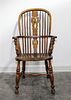 An English Windsor Arm Chair Height 42 1/2 inches.