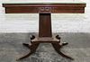 A Duncan Phyfe Style Mahogany Flip-Top Table. Height 27 1/2 x width 35 x depth 18 inches.