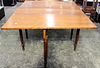 * An American Cherry Drop Leaf Table Height 20 1/4 x width 46 x depth 20 3/4 inches (closed).