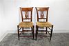* A Pair of American Walnut Side Chairs Height 33 1/2 inches.