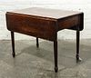 * An American Walnut Drop Leaf Table Height 20 x width 32 1/2 x depth 28 inches (open).