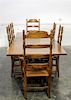 * An American Oak Dining Set Height of armchairs 46 inches.