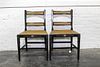 * A Pair of Ebonized and Painted Caned Chairs Height 32 inches.