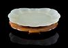 * A Pale Celadon Jade Dish Length 4 3/8 inches.