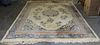 * A Chinese Wool Rug 10 feet 7 inches x 7 feet 9 inches.