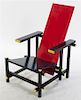 A Red and Blue Chair, after the Gerrit Rietveld Style, Height 34 1/2 inches.