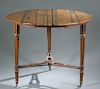 Round tiger maple table with married stretcher.