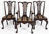 SET OF THREE CHIPPENDALE-STYLE CARVED MAHOGANY DINING CHAIRS