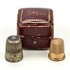 ANTIQUE 10K-14K YELLOW GOLD AND SILVER SEWING THIMBLES, LOT OF TWO