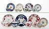 BRITISH HAND-PAINTED FLORAL MOTIF CERAMIC CUP AND SAUCER SETS, LOT OF EIGHT